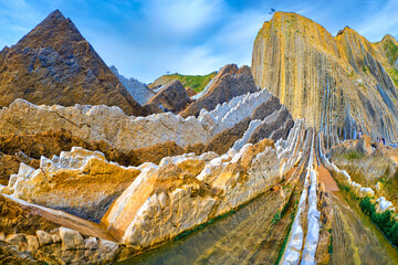 Steeply-tilted Layers of Flysch, Flysch Cliffs, Basque Coast UNESCO Global Geopark, European...