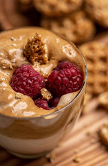 
Coffee mousse with raspberries. Close-up.