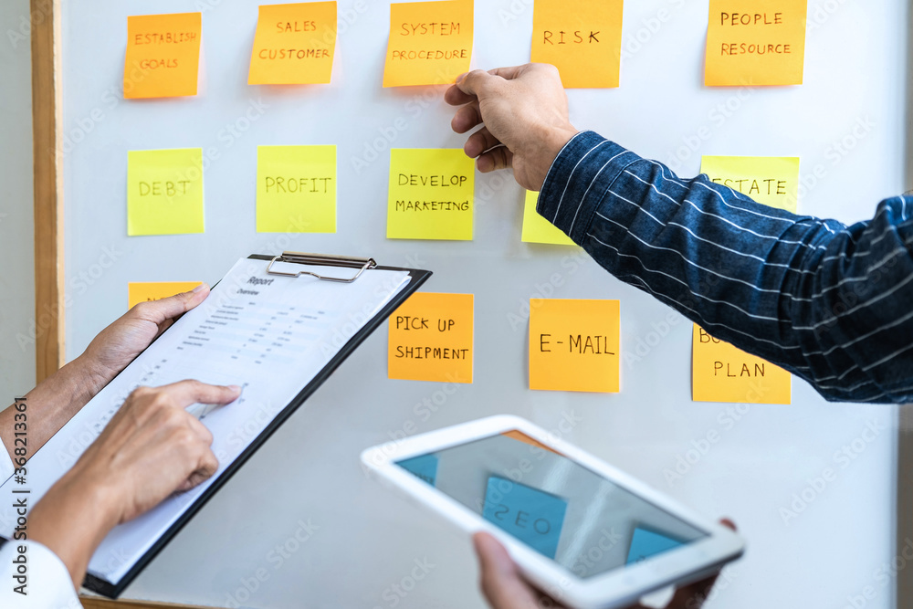 Aufkleber two creative meeting and planning use post it notes on board to share idea