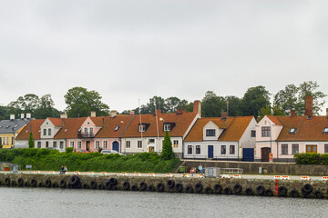 Sweden - August 14, 2011: Beautiful, little, cozy and multicolored buildings near the sea (at the pier)