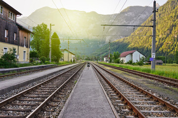 Railroad tracks and High Mountain background in the Morning.