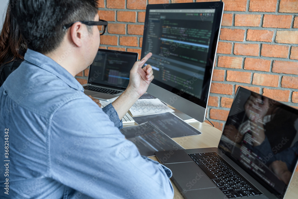 Leinwandbilder Programmers at Developing programming and website working in a software