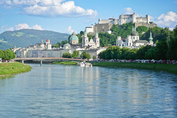 Fototapeta na wymiar Festung Hohensalzburg and Salzach river in summer of Salzburg, Austria.