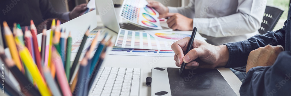 Poster two creative graphic designer working on color selection and color swatches