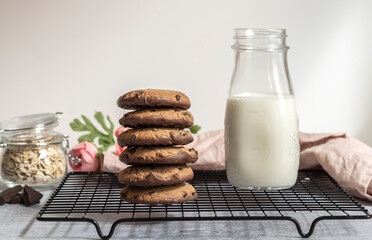 Chocolate oatmeal cookies with milk in the morning.