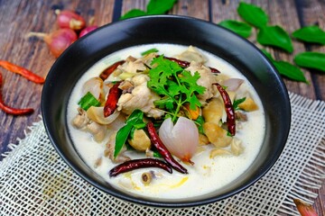 Authentic Thai chicken coconut milk soup with herbs (Tom Kha Gai). Thai Food.