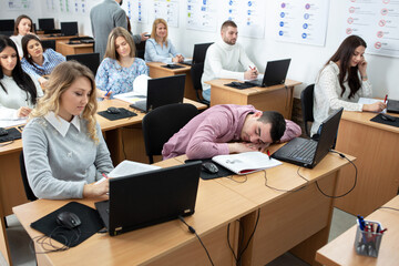 Fototapeta premium Learning a new skill in the classroom, sleeping