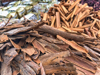heap of cinnamon sticks as a background