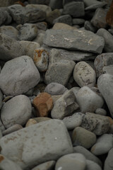 gray sea round stones close-up