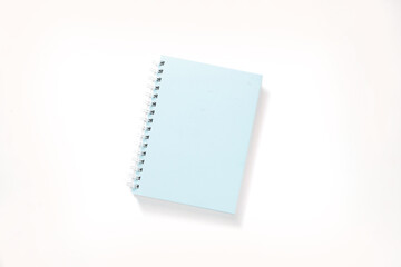 baby blue notebook on white background with clipping path. mock up