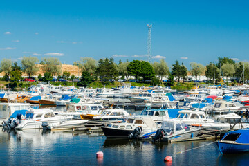 Fototapeta na wymiar Kotka, Finland - 22 June 2020: A view on the parking of boats and yachts in the gulf Sapokka.