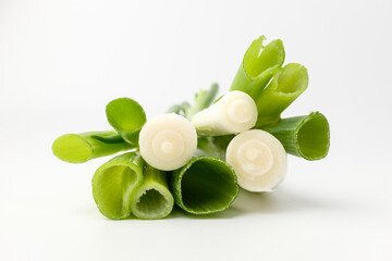 Fresh leeks on white background