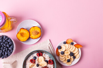 porridge, fruit and berries as healthy yummy breakfast concept