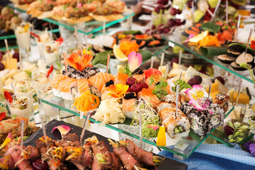 Assortment festive appetizers on the plate, selective focus. Festive buffet. As a photo, for the menu of restaurants, cafes and promotional items.
