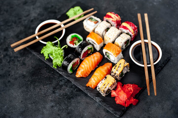 Set of sushi on a stone background. Dinner for two