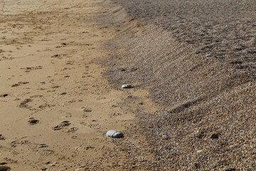 Chesil Beach - where shingle meets sand - in Dorset, England.