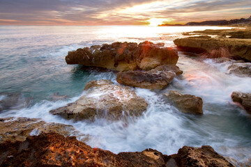  Mediterranean landscape. Sunrise in Jávea (Alicante). Seashore with rocks. Seascape © Jose Prieto