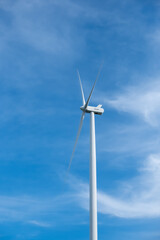 wind turbine against blue sky