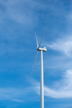 wind turbine against blue sky