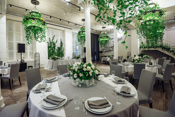 Luxury restaurant interior in grey and green tones