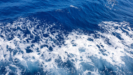 Blue sea background. Aqua sea water surface. Sea surface view.