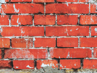 Brick wall, weathered, worn wall damaged paint. Grunge Concrete Surface. Great background or texture.