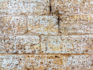 Brick wall, weathered, worn wall damaged paint. Grunge Concrete Surface. Great background or texture.