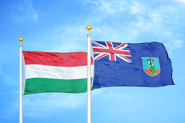 Hungary and Montserrat two flags on flagpoles and blue cloudy sky