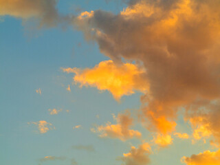 Beautiful background of clouds and sky at sunset at the end of the day