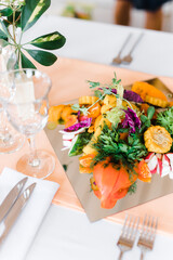 mirror plate with vegetables on the table