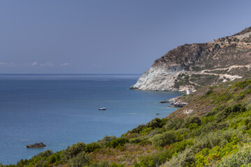 Fototapeta premium Coastline of the Mediterranean island of Corsica, with the Tour D'Albu visible in the far right