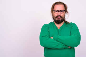 Bearded man with mustache and long hair against white background