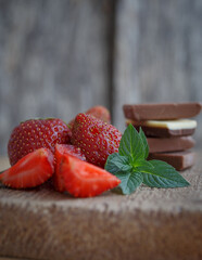 strawberries on wooden background