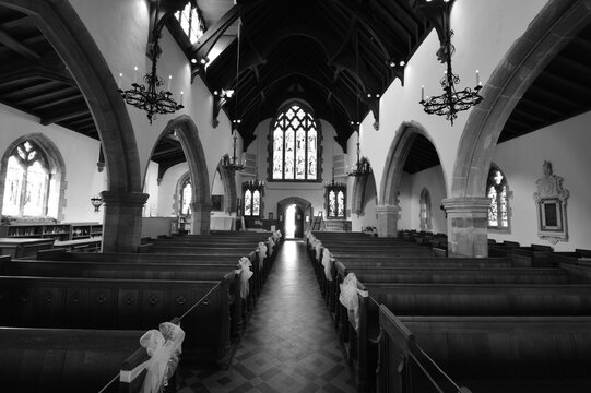 Inside of an English church in summertime.