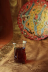 Turkish Tea on classic glass
in the oriental style vintage. 
traditional still life
