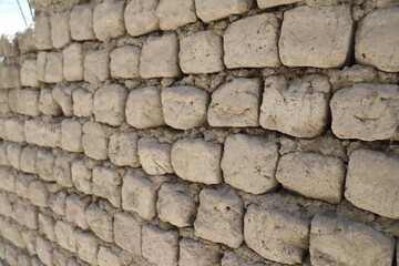 mud & stone wall, no motar
