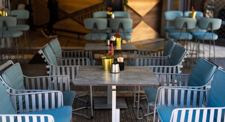 Empty tables in the cafeteria in city during coronavirus pandemic