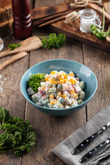 Russian salad with crab sticka and corn