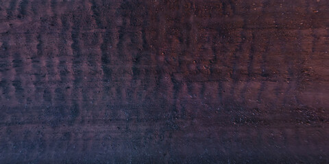 view from above on surface of gravel road with car tire tracks