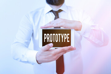 Writing note showing Prototype. Business concept for first and usually functional form of a new...