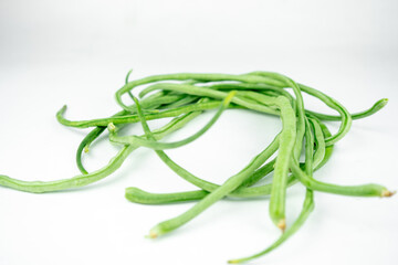 fresh long green beans isolated on white