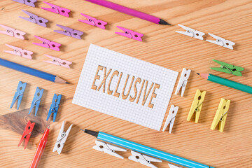 Conceptual hand writing showing Exclusive. Concept meaning limiting or limited to possession of use...