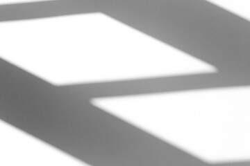 Shadow overlay effect for photo. Geometric shadow from a window or door on a white clean wall in clear weather. Geometric composition shadow