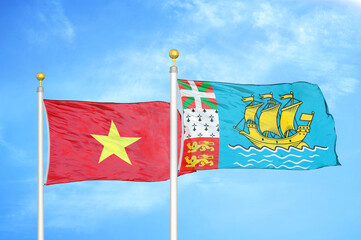 Vietnam and Saint Pierre and Miquelon two flags on flagpoles and blue sky