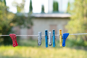 Clothesline on the street with clothespins