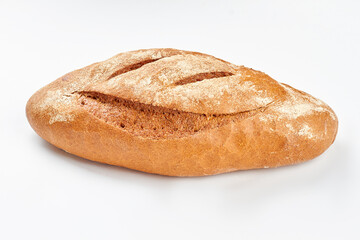 Loaf of organic bread on white background. Fesh whole grain bread. Natural food concept.