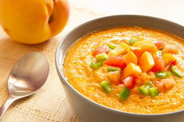 Peach gazpacho with vegetables. Traditional spanish recipe.