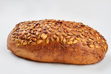 Organic grain wholemeal sourdough bread. Artisan organic wholemeal bread loaf. Isolated on white background.
