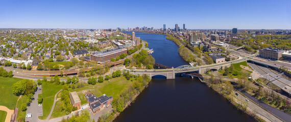 Aerial view of Cambridge on the left and Boston on the right connected by Boston University Bridge from Charles River, Boston, Massachusetts MA, USA. 