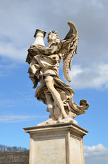 Fototapeta na wymiar Sculptures on Sant'Angelo Bridge, the Bridge of Angels in Rome, Italy